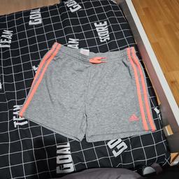 girls grey adidas shorts age 14-15 was washed when brought but daughter never worn them