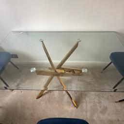 Gold and blue Dining table with 5 chairs for sale good condition chairs.. glass in perfect condition no scratches paid 800 for 6months ago
