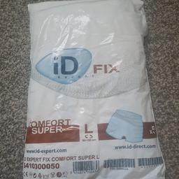 1 unopened pack of 5 disposable pants to help keep pads in place. There's 5 pairs in the pack