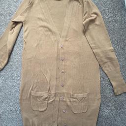 - Excellent condition long cardigan 

- Colour: Camel 

- Brand: ZARA

- Only worn once

- Will be happy to combine postage costs if purchasing more than one item

- Tracking details will be provided with delivery