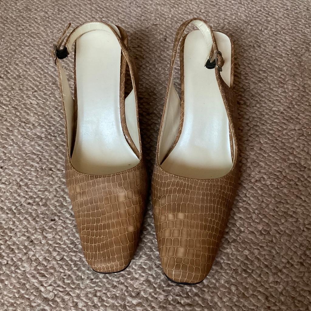 Have been worn several times, still look in good condition apart from left heel is missing the sole, see photos. Heel height is 2.5in