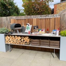 Original Grillo outdoor worktop kitchen, was £4.5k new inc. del’y and install. In great condition. Includes both planters which are 40cm wide each! The unit is 3.2m width in total including the planters. 64cm deep. The bottom shelf is 44cm high and the main worktop is 89cm high. Supported with stainless steel structure. A few stains on the porcelain worktops but all minor. The back panelling is a hardwood which is turning grey. Requires someone to dismantle.