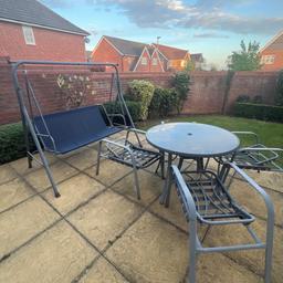 the perfect outdoor garden furniture.Navy blue  including one swing and a table with 4 chairs perfect for family gatherings.Comes with chair and swing cushions