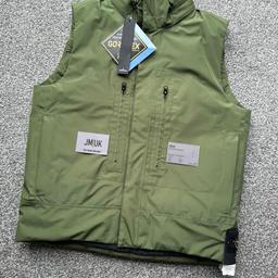 *Ridiculous bit of kit this. Above and beyond the best gilet Stone Island have ever produced. The quality is outstanding!

SIZE L (25” PTP)


3L GORE-TEX IN RECYCLED POLYESTER DOWN: Down vest featuring a performance Gore-Tex membrane, exhibits the black diamond label reserved for high-performance garments. The outer face is made of 100% recycled polyester, bonded with the thin Gore-Tex membrane, extremely breathable, durably waterproof and totally windproof. The intangible internal protection mesh is as well made of paste-coloured 100% recycled polyester, limiting the use of water and chemical agents. The garment is padded with premium feathers. It is fully heat seam-taped and treated with a PFC free anti drop agent.

- EXTERNAL FABRIC: 100% Polyester
- INSIDE: 100% Polyester
- MEMBRANE: 100% Polytetrafluoroethylene
- Lining: 100% Polyester
- Paddin
