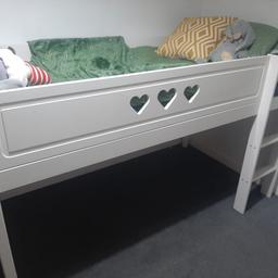 good solid white kids single bed couple steps up into it good bed to have storage under it