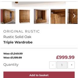 Oak furniture land original rustic solid oak triple wardrobe , used for 10 years bottom handles missing easy fix . Buyer must collect and disassemble