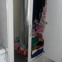 Hi
Selling Beautiful Wardrobe with Two Mirror Doors 
On it 
Quick sale need to go quickly 
Because I’m moving house 
Cash on Collection 
From B19 
Newtown