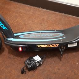 KID'S RAZOR POWER CORE E100 SCOOTER with charger batteries are holding charge lights up but .none runner. good condition spares or repairs