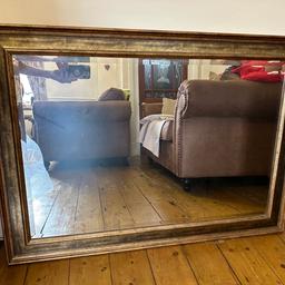 Stunning large bronze/gold mirror. 42” x 30” and VERY heavy. Selling due to redecorating.