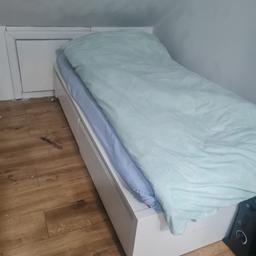 Single bed with two side storage wardrobes. Bed has a mark at the bottom end otherwise in good condition. No headboard.