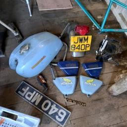 parts from a p reg Honda 400. petrol tank, that still has petrol in so no leaks. handle bars?? some fairing pairs. badge an indicator. and a black electrical part. I have been told they are roughly worth £150 to the right person.