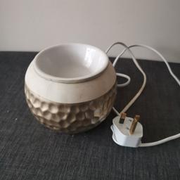 In good condition. A great wax melter. With on off switch