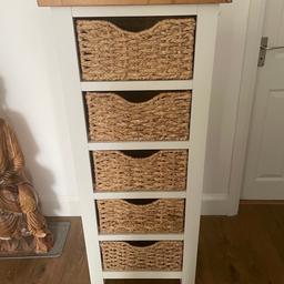 Cream coloured wooden unit with five wicker baskets . In excellent condition,
22inches wide x 51 inches high
Collection only