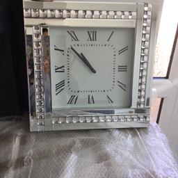 Rhombus mirrored clock, battery operated in excellent condition.
18 inches x18 inches
