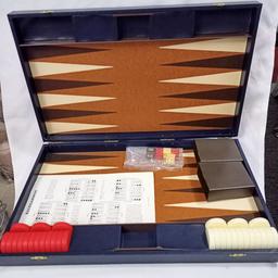 LOVELY VINTAGE GOOD SIZE BACKGAMMON SET FAUX LEATHER CASE APPROX 16" BY 10" FEW SIGNS OF WEAR ON OUTER CASE BUT VERY NICE INTERIOR.