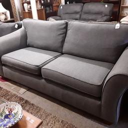 This lovely quality very large three-seater grey fabric sofa is in good all-round used condition. There is some very slight colour fade to the left hand arm otherwise it is fab!...

87 inches long x 39 inches deep x 31 inches high.

Our second hand furniture mill shop is LOW COST MOVES, at St Paul's trading estate, Copley Mill, off Huddersfield Road, Stalybridge SK15 3DN...Delivery available for an extra charge.

There are some large metal gates next to St Paul's church... Go through them, bear immediate left and we are at the bottom of the slope, up from the red steps... 

If you are interested in this or any other item, please contact me on 07734 330574, or on the shop 0161 879 9365...Many thanks, Helen.

We are normally OPEN Monday to Friday from 10 am - 5 pm and Saturday 10 am -  3.30 pm.. CLOSED Sundays. CLOSED Bank Holiday long weekends...