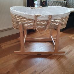 Lovely Claire de Lune moses basket, inclusive of mattress. Slight tear to the outer cover, which can be easily stitched (see picture) hence offering this for free.