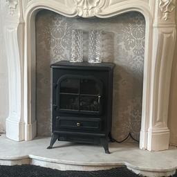 Black electric fire 
Marble arth I also have the marble back but that’s taken out ready 
Fire surround 
Price is for all