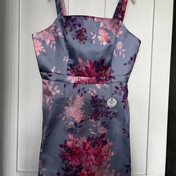 Lilac floral satin mini dress with square neck by Chi Chi London. BNWT, never been worn.  Bought last year for £38 for wedding this year, unfortunately I’ve changed shape so it no longer fits comfortably.  It’s a petite 14 but I’d say more size 12.