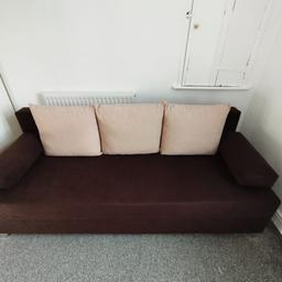 comfortable sofa that folds out into a bed, no markings and almost like new, selling due to moving house