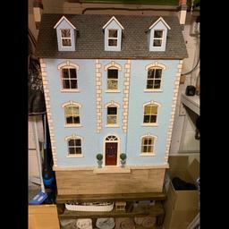 Very large very heavy collectors item includes all furniture garden items figurines and lots of extras. This dolls house has lighting throughout Dimensions… 114cm height 80cm width and 47cm depth. 