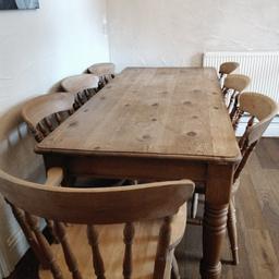Lovely Solid Pine Dining Table with 8 chairs including 2 Carver chairs.