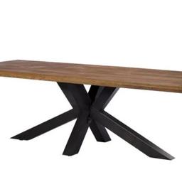 Mid Oak dining table.  Seats 8 comfortably. Solid Oak with crossover black legs (as in photo) currently on sale in Leekes (reduced to £999) 
Excellent condition.