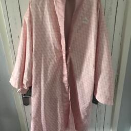Puma kimono .. kind of free size due to the fit so could fit up to 16 ? Like new