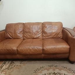 Leather sofas three, two seaters and one arm chair, in good condition.