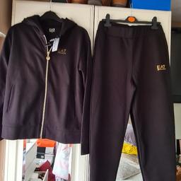 Genuine Emporio Armani Tracksuit Size Small Fit 8-10 New With Tags.
Paid £155
Black & Gold.