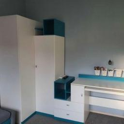 For sale kids bedroom furniture set Corner wardrobe, desk, tall cabinet and sideboard. 
Used but good condition. Colour white and turquoise. 
Price dropped to £150 for a quick sale Cost me £840 2 years ago. 
Pick up South Kirkby.