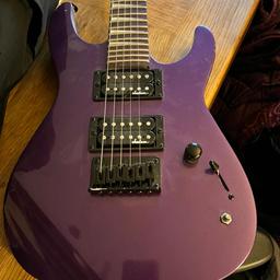 Never been used childs purple guitar in brilliant condition