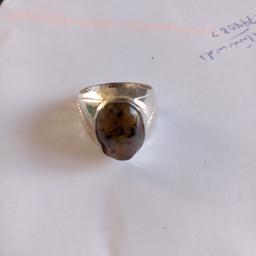 New without tags
31.50 carat weight
Dark brown appearance
Hardened 
Untreated 
Not enhanced 
100% original gemstone otherwise money back guarantee 
Inclusions only with jewellers loupe 
Size can be seen with measuring scale
Could deliver locally at fuel charges or collect from my home 
For further queries call me 
07732141935