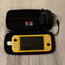 Nintendo Switch Lite With Case , Charger and Two Games . 
Only used a few times