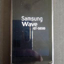 retro mobile phone fully working with USB cable "no plug"

https://m.gsmarena.com/samsung_s8500_wave-3146.php