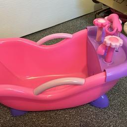 Pink dolls bath 
Excellent condition 
Little shower works when pumped with the tap