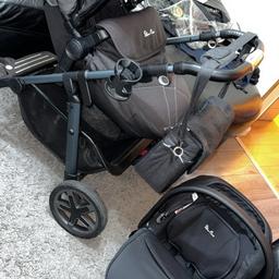 Selling my Silvercross travel system pram it includes 
Newborn part 
Toddler seat unit 
Matching pram bag 
Pram frame 
Black car seat 
Car seat adapters 
Isofix base ( very very scratched ) 
Black hood and apron 
Spare grey hood and apron 
Cup holder , rain cover and rain cover bag  
Inbox me for more pics , newborn part etc.
£160 the lot