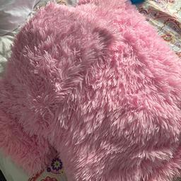 Double pink fluffy bedding 2 pillowcases in great condition USA handful times but changing colour so please take alook at my other stuff any questions please ask thankyou x