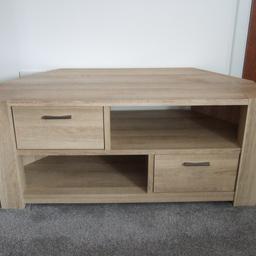 This is a 2 draw Light Oak corner unit it measures 48"L x 20"W x 21"H in very good condition