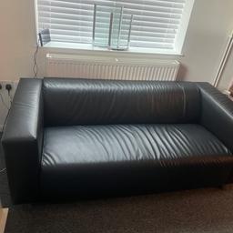 Black faux leather sofa from ikea