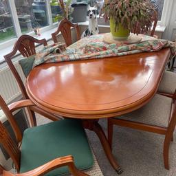 Large dining table and six chairs two are carver chairs. The table also extends and can seat eight easily.
Small mark on table but I think a good polisher would be able to get it out.