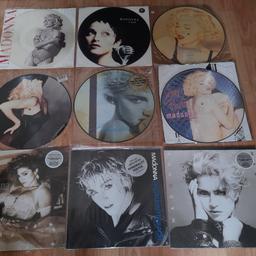 collection of vinyl includes 2 x sealed lps / picture discs / books