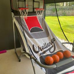 Basketball arcade game 2 player like new.

Folds flat for storage. Full working order with 4 balls.
