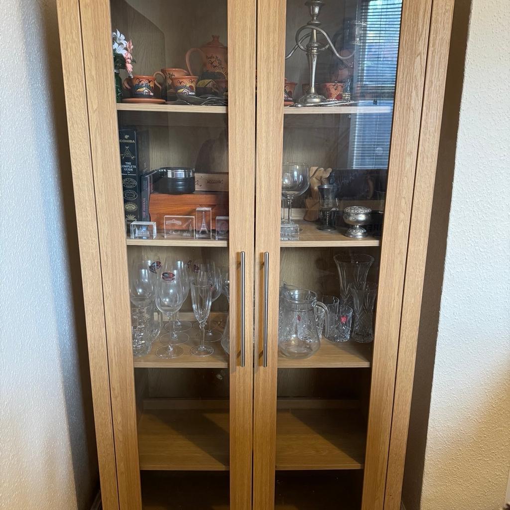 Display cabinet
Two glass doors
Four fixed shelves
Dimensions -

Width - 91.44cms
Height - 182.88cms
Depth - 38.1cms
Width is wider at the front than back due to a frame

Pet and smoke free home
Cash on collection