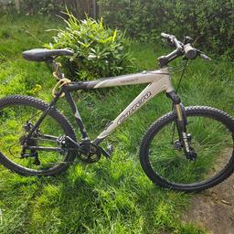 26 inch wheele, Adult mountain bike few scratches, little rust on front suspension forks. New tyres are on the bike with new cables for brakes.