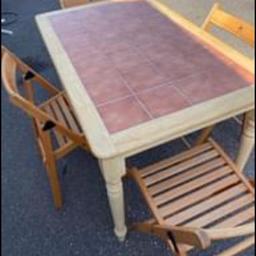 Selling this lovely tiled top wooden table for a friend 
Sorry no chairs 
Excellent condition 
Would need van or large car to collect as legs do not come off 
Just been reduced to £10 
Needs to be gone asap