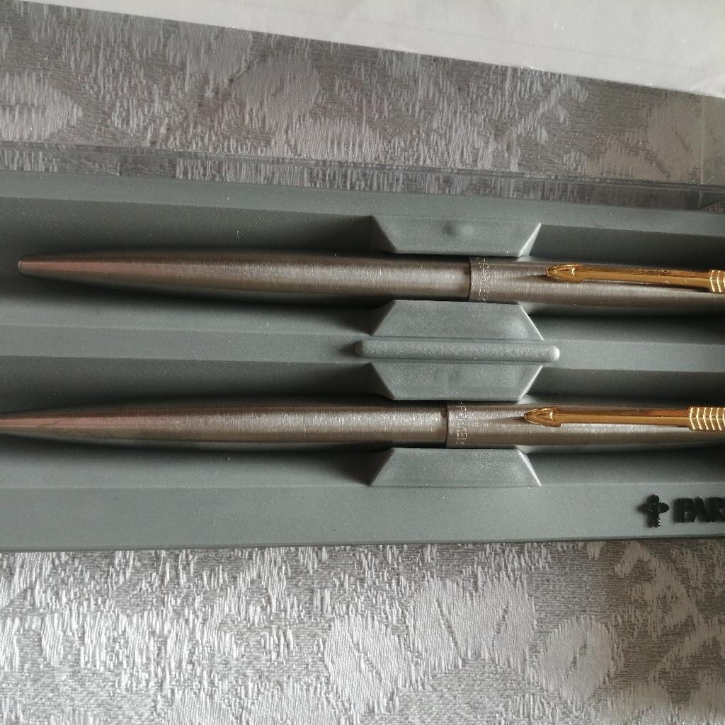 New in box, never used, not a recent gift set, nice gold colour clip on silver casings, stainless steel, Parker brand, was expensive when brought... Both working pen and pencil set... Collection only