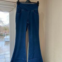 Brand new and unworn halara high waist crossover waistband flared jeans.wide flare.size M.id say size 10 would be best fit.these are quite long and far too long for me as I’m only 5ft which is reason for sale.not suitable for a shorter lady!very nice and comfortable material,like a legging feel.