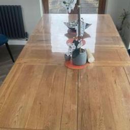 selling.tbis beautiful dinning table 210 cm by 100 cm it can be 4 6 or 8 seater 
comes with 4 chairs