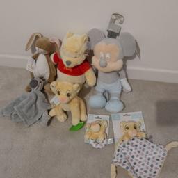 All brand new with tags attached and in packaging 

Guess how much I love you bunny 
Winnie the pooh 
Micky mouse (hands make rattle noise) 
Zebra comforter 
Lion king Simba plush with teether 
Simba rattle 
Simba comforter